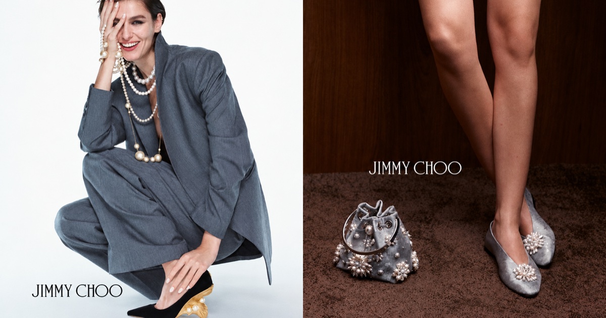 Model in grey suit wearing pearl necklaces and embellished heels for Jimmy Choo campaign
