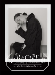 Model Jiahui Zhang in a dark jacket posing for Rouge Fashionbook editorial photographed by Sam Marie-Saint
