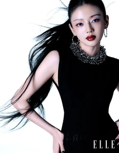 He Ruixian wearing a black dress and beaded necklace for Elle China, photographed by Dalong Yang
