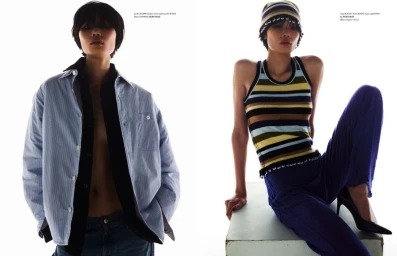 Two models showcasing contemporary apparel against a bright white background in a magazine spread editorial.