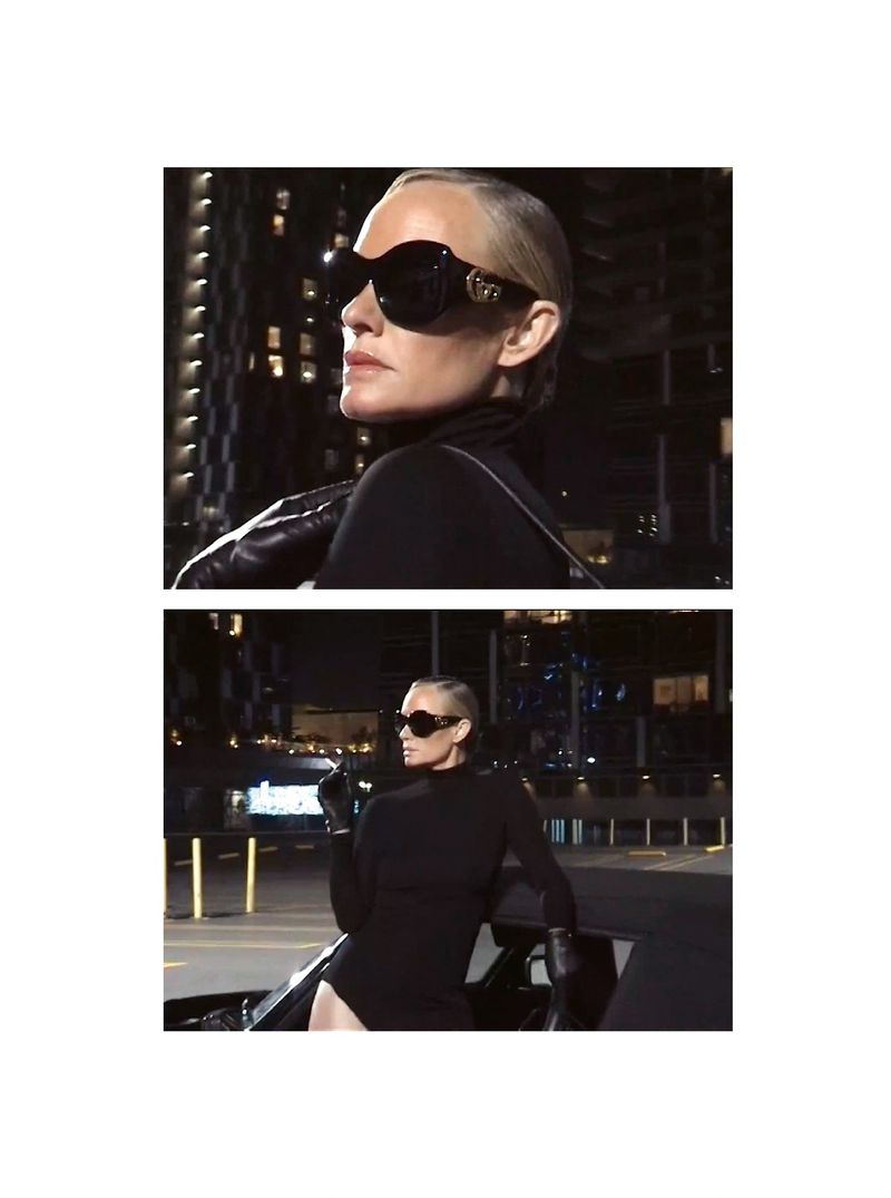 Amber Valletta in oversized black sunglasses and black turtleneck leaning on a car at night for System Magazine