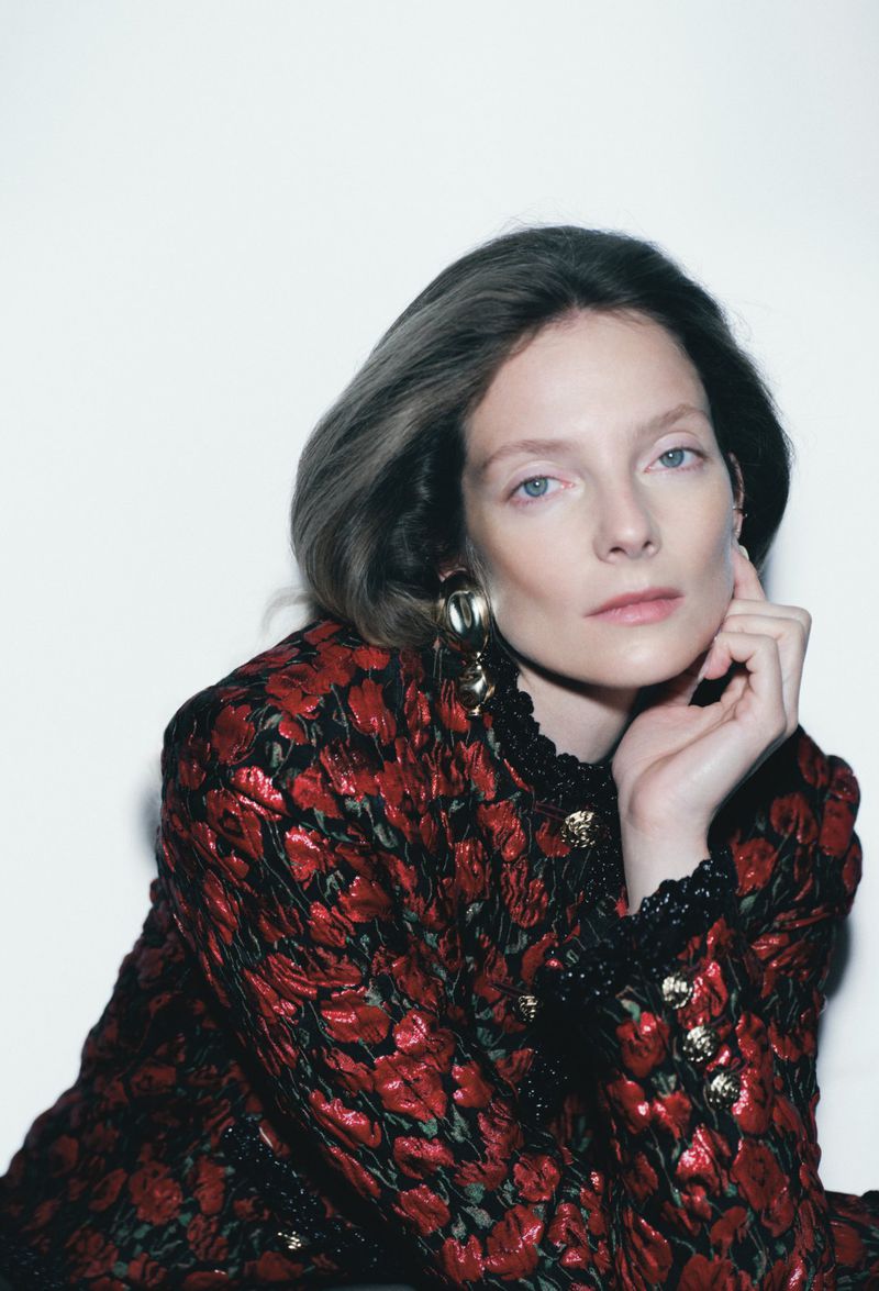 Eniko Mihalik wearing a patterned red jacket for Forbes Spain photographed by Javier Biosca