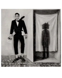 Adrien Brody in a dark suit standing next to a framed structure containing a curtained shadow silhouette