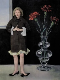 Gwendoline Christie wearing a brown plaid coat standing beside a large glass vase with red flowers for Bauhaus Ballet