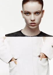 Close-up split image of a model wearing a dark patterned top and a white coat with hands in pockets against a white backdrop.