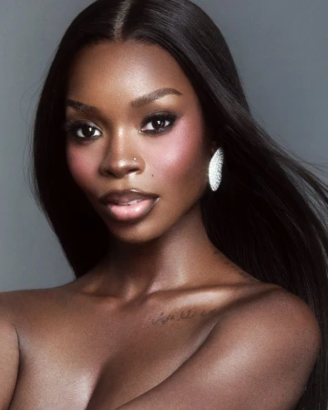 Portrait of Olandria Carthen wearing a large crystal earring for The Cut, photographed by Mikael Schulz.