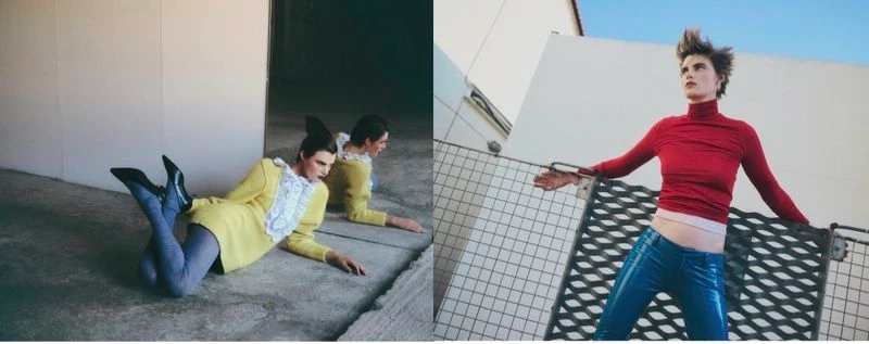 Model wearing a red turtleneck and blue pants posing against an architectural background for Vogue Greece