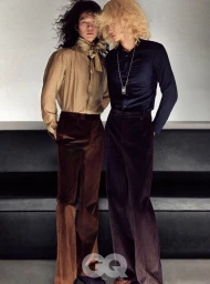 Two male models with long hair wearing silk shirts and corduroy trousers posing for GQ Korea editorial NIGHT SHIFT by Choi Narang.