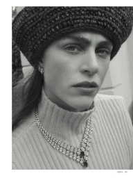 Model Hedvig Palm wearing a knitted beret and diamond necklace for Telva photographed by Tomás de la Fuente