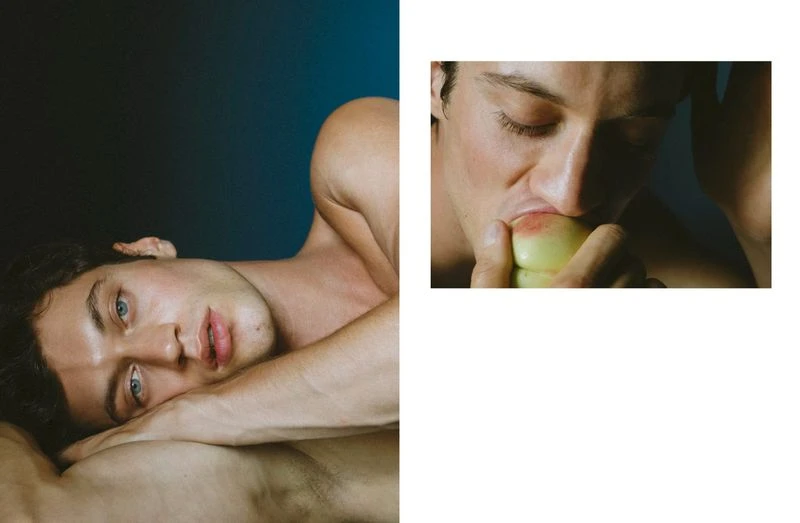 An artistic split-image portrait features a young male model with blue eyes lying down, contrasted with a close-up of him biting a green apple.