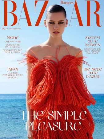 Harper's Bazaar cover featuring a woman in a red, feathered dress, shot in natural light with ocean in the background. Fashion and lifestyle theme.