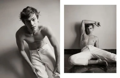 Diptych of a shirtless young man in white jeans posing leaning forward and reclining against a wall on a dark reflective floor.