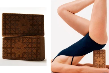 Close-up of a person in a dark swimsuit performing a stretch over a patterned cork yoga block for Dior.