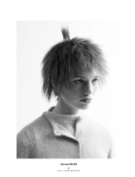Model Lilja Drab with spiky hairstyle wearing buttoned top in 10 Magazine Deutsch editorial