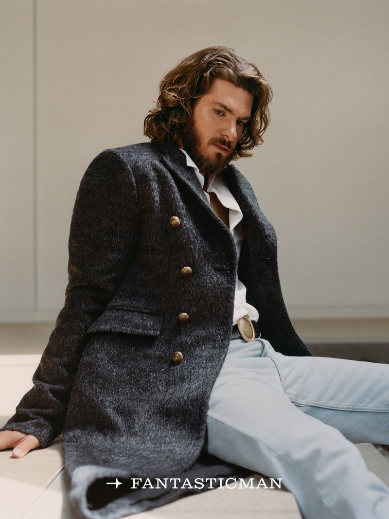 Andrew Garfield with long hair and beard wearing a dark tweed double-breasted coat and white shirt for Fantastic Man China.