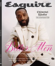 Chiwetel Ejiofor wearing a cream white coat on a magazine cover for Esquire UK