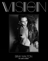 Model Binx Walton wearing a black leather jacket against a dark studio background for Double Vision September 2026
