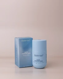 Blue Balense skincare serum bottle and matching box resting on a pale neutral surface.
