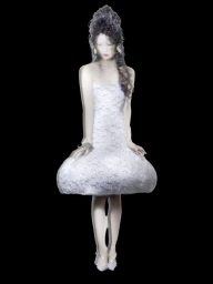 Model Xie Chaoyu in a white lace dress with an elaborate updo against a black background for Numero Netherlands.