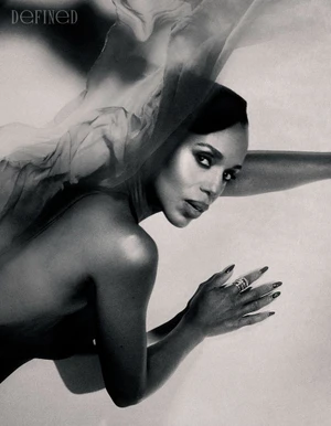 Monochrome portrait of Kerry Washington posed with flowing translucent fabric for DEFINED Magazine