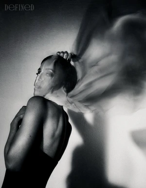Monochrome portrait of Kerry Washington in motion with sheer fabric, shot by Rachell Smith for DEFINED Magazine