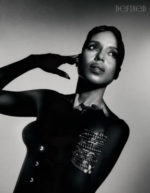 Monochrome portrait of Kerry Washington wearing stacked bracelets against a plain background