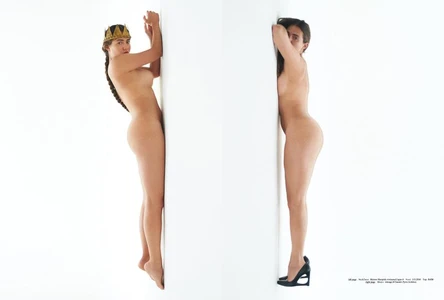 Two figures posing against a white corner wall, one wearing a crown and braid, the other wearing black heels.