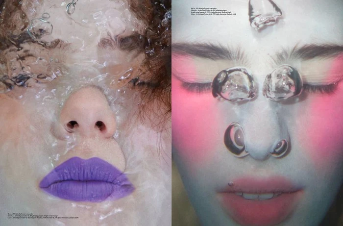 Close-up portrait of two faces submerged underwater with floating air bubbles and vibrant makeup.