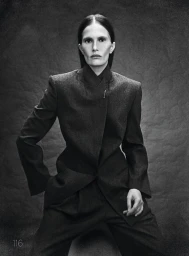 Model in grey wool jacket with high collar photographed in monochrome for Harper's Bazaar Germany editorial