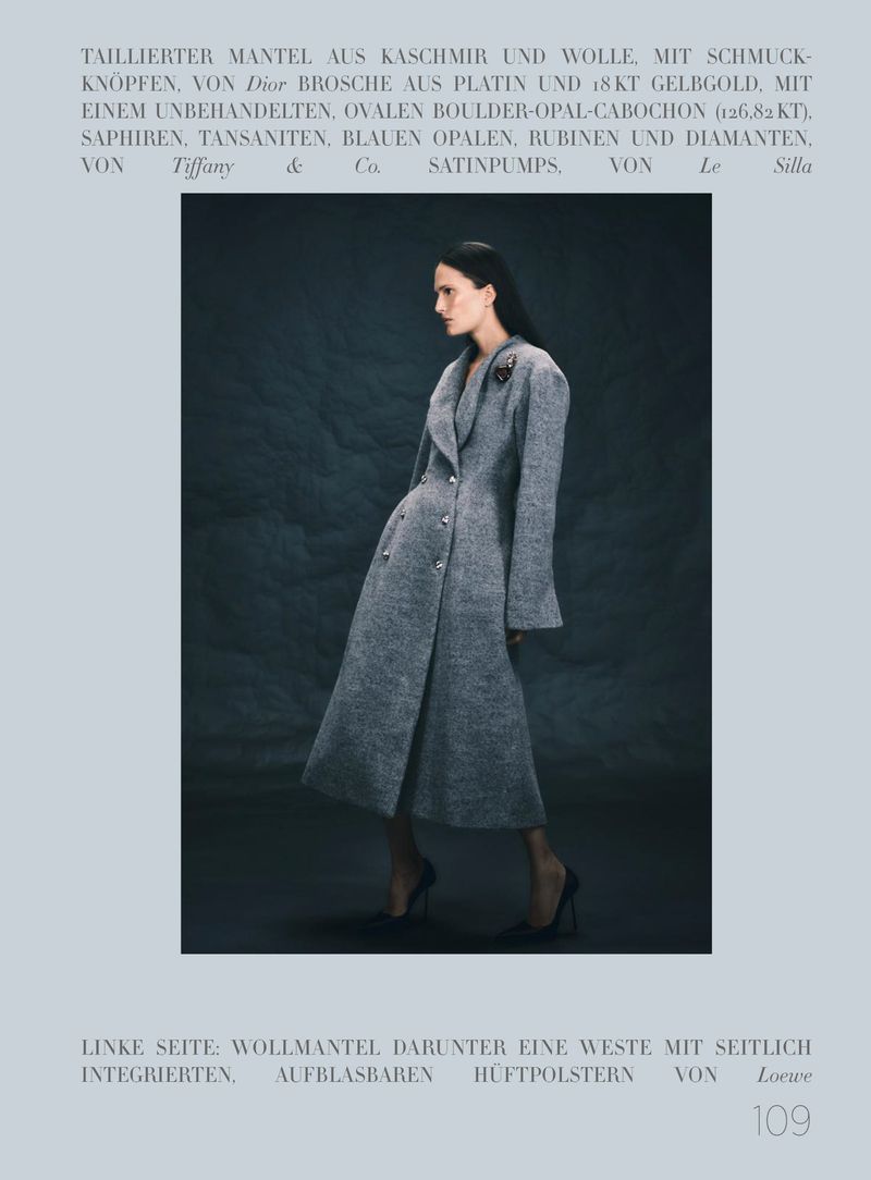 Model Alla Kostromichova wearing a long grey coat for Harper's Bazaar Germany