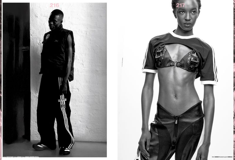 Two fashion models pose indoors. An African-American adult male models Adidas track pants, while an African female model poses in a leather bra.