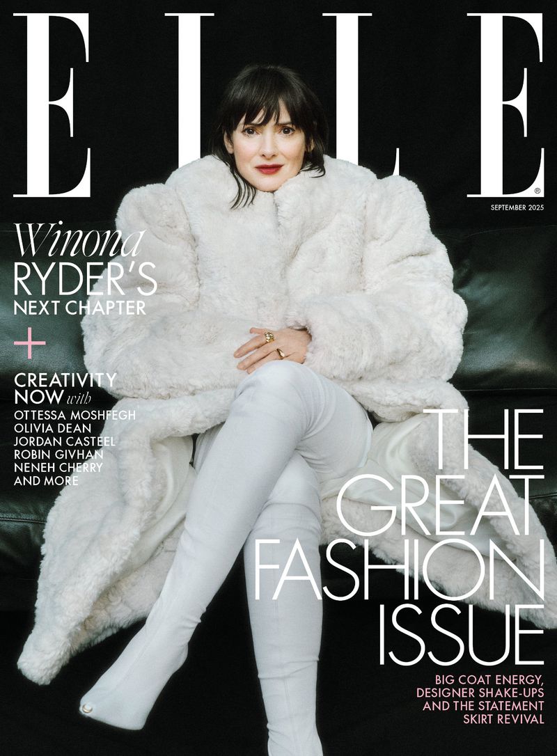 Elle magazine cover featuring Winona Ryder wearing a white fur coat and white boots, sitting on a couch against a black background.