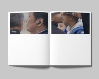 Open magazine spread displaying two horizontal photo stills featuring people in profile against an out-of-focus background.