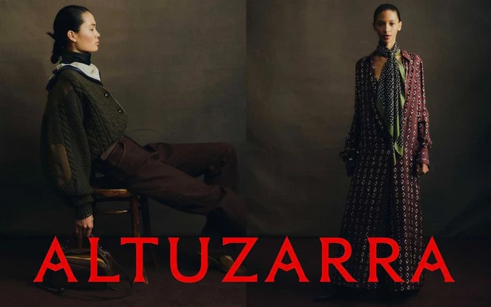 Two models showcasing Altuzarra fall 2026 fashion looks against a dark textured backdrop with bold red brand typography.