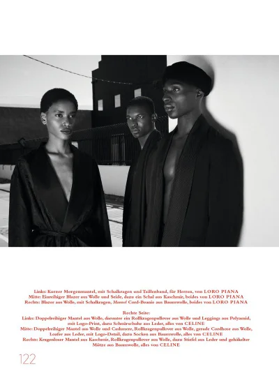 Three models wearing dark tailored garments posed outdoors against an architectural background in black and white.