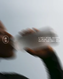 Motion blurred portrait of a person drinking from a bottle for SOM daily elixir shots
