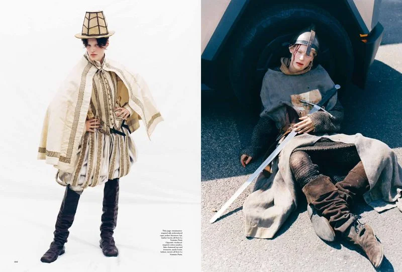 Double page fashion spread featuring two models in historical-inspired medieval attire with armor and weaponry.