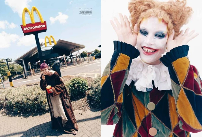 Model dressed in clown makeup and patterned velvet harlequin jacket posing outside McDonald's in More or Less Magazine editorial