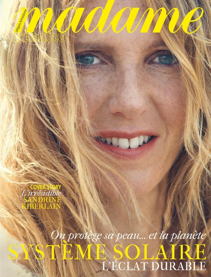 Close-up portrait of a woman with blonde hair and freckles smiling for Madame Figaro magazine cover by Thiemo Sander