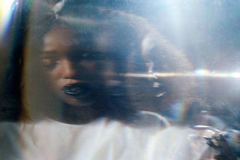 Portrait of John Glacier with prismatic light refractions and double exposure effect for i-D Magazine