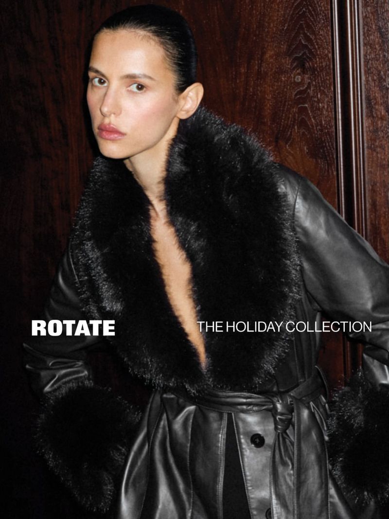 Model in black leather coat with faux fur collar for Rotate Holiday Collection