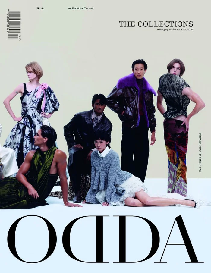 Group of six fashion models in designer clothing posing against a plain light background for ODDA Magazine.