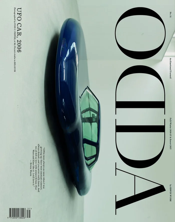 Blue sculpture shaped like a car titled UFO Car, 2006 against a white background with ODDA Magazine typography