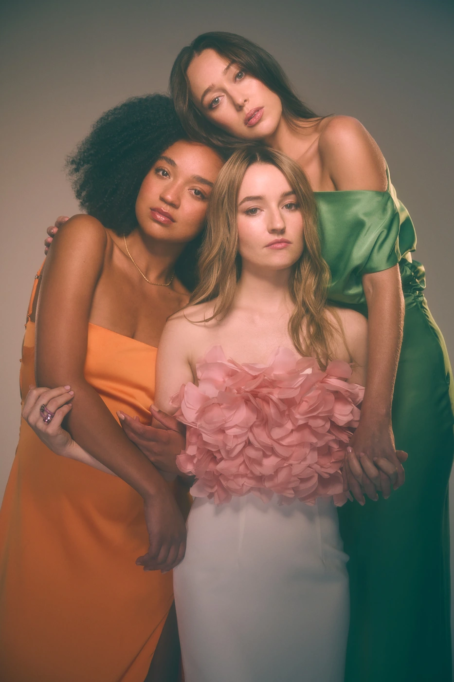 Three women posing closely together for Apple Cider Vinegar publicity portraits by photographer Seiya Taguchi