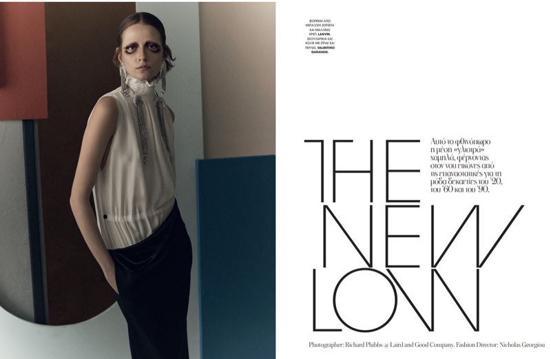 Model wearing a white sleeveless top and black skirt against a geometric color blocked background with bold typography on the right