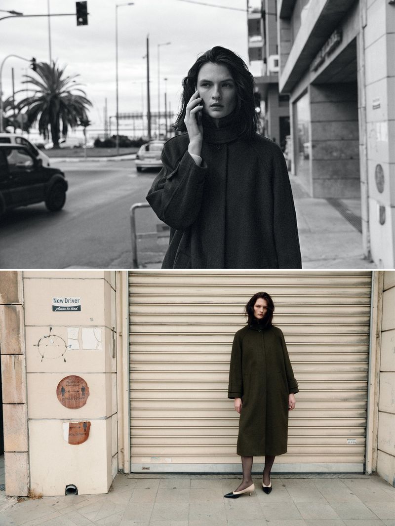 Model Lara Mullen wearing a dark coat for Vogue Greece urban armor project photographed by Magnus Lechner