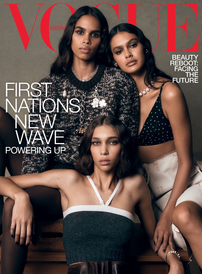 Vogue Australia cover featuring three Indigenous Australian women with dark hair and neutral makeup wearing contemporary fashion.