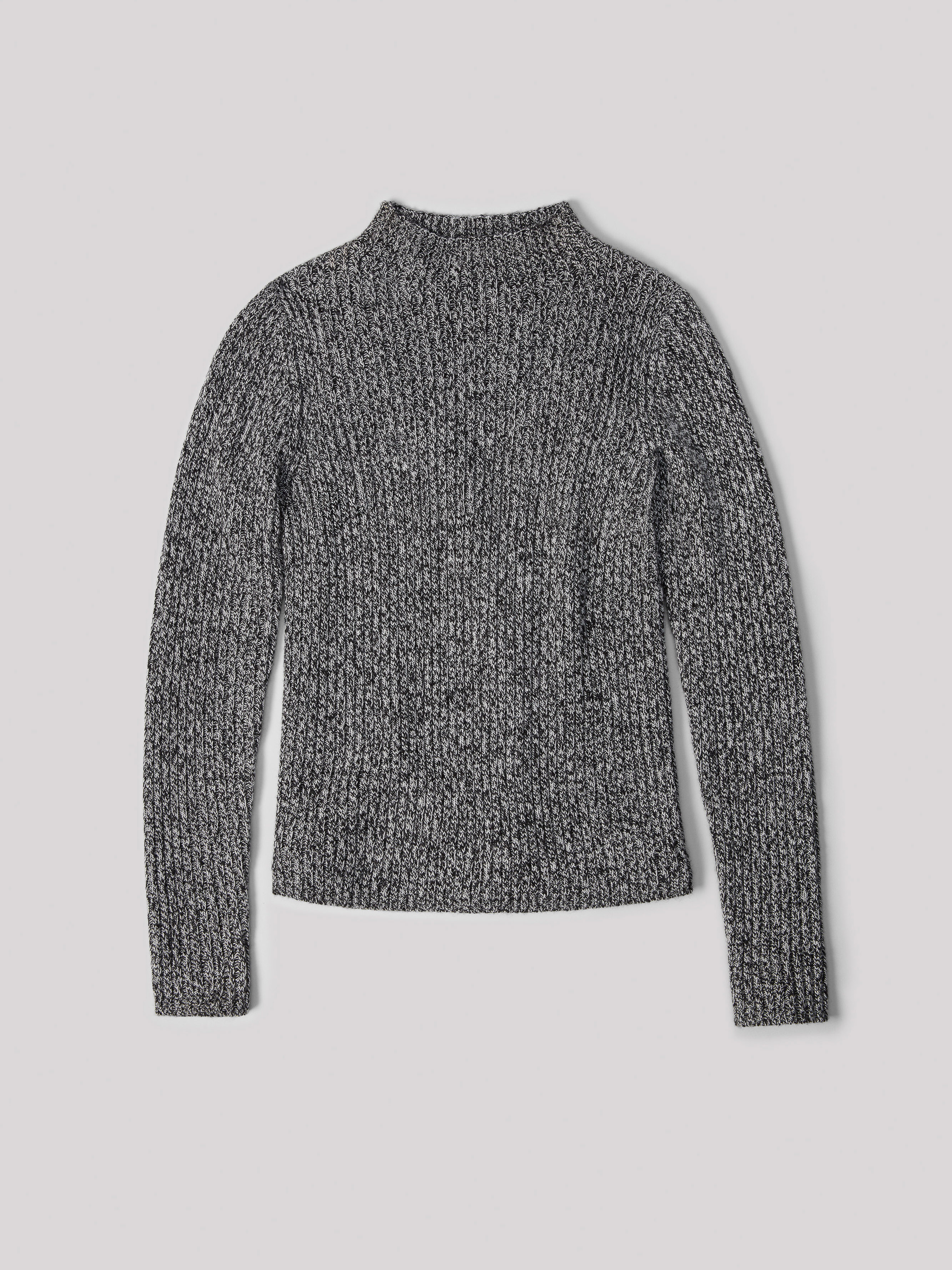 Grey knit sweater with a ribbed texture and mock neck, flat lay on a neutral background, showcasing knitwear fashion.