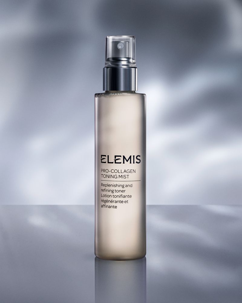 Elemis Pro-Collagen Toning Mist product shot. Close-up of a bottle on a neutral background with subtle lighting. Cosmetics and skincare.
