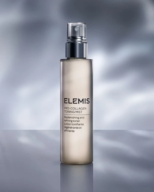 Elemis Pro-Collagen Toning Mist product shot. Close-up of a bottle on a neutral background with subtle lighting. Cosmetics and skincare.